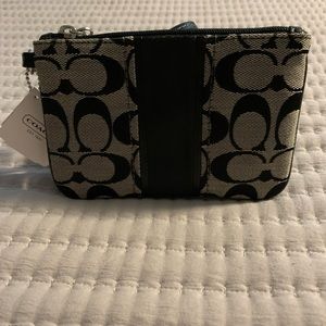 Original Coach wristlet.